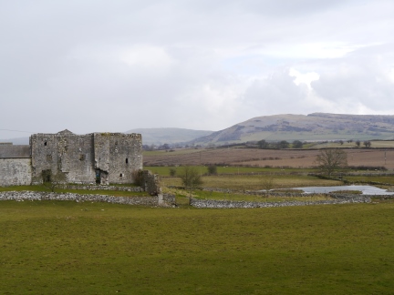 The ruins of Beetham Hall with Farleton Fell in the distance