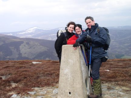 Lisa, Val and Dave by the trig point on Cairn Caidloch
