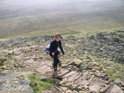 Lisa climbing Pen-y-Ghent