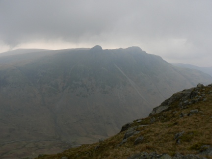 The cloud lifts above the Langdale Pikes