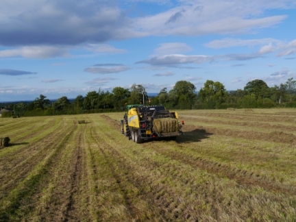 Farmer collecting hay near Sawley