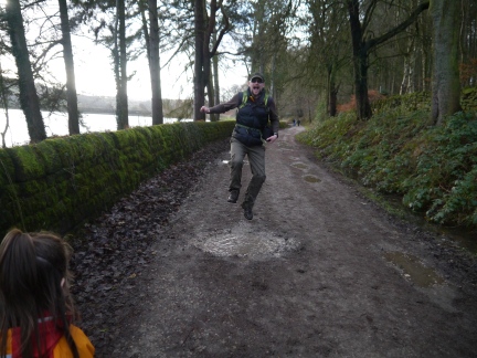 Showing Rhiannon how to really jump in muddy puddles