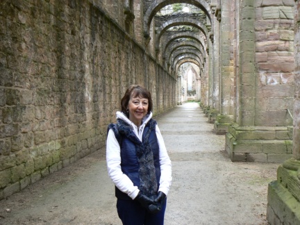 Mum standing in the north aisle of the Abbey church