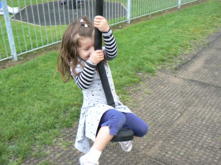 Rhiannon on the zip slide in the playground in Pateley