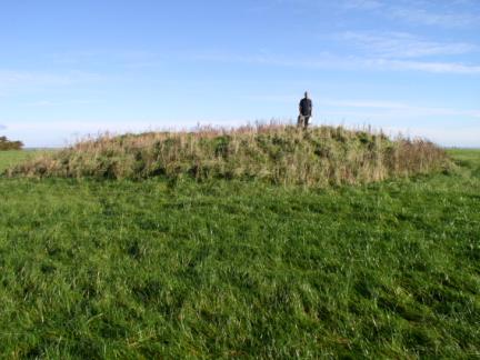On the small grassy tumulus above Boltby Scar