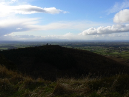 Looking over the wooded slopes of Hood Hill to the Vale of Mowbray
