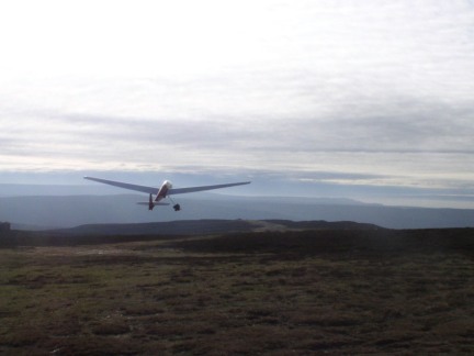 A glider takes off on Carlton Moor