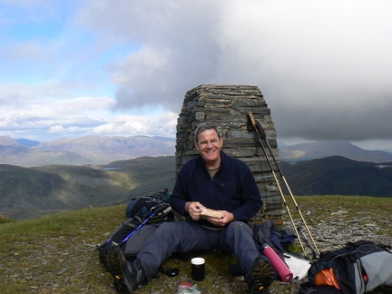 Dave by the trig point on Moelwyn Mawr